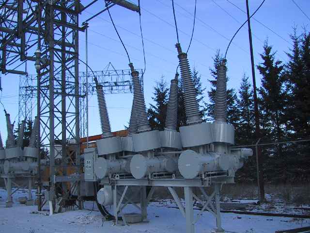 SF6-Close-up of a circuit breaker with electrical wires connected, ensuring safety and preventing electrical overload